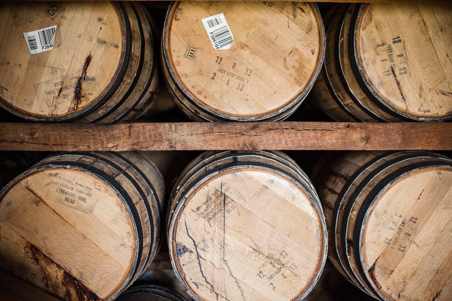 Oak barrels on shelves.