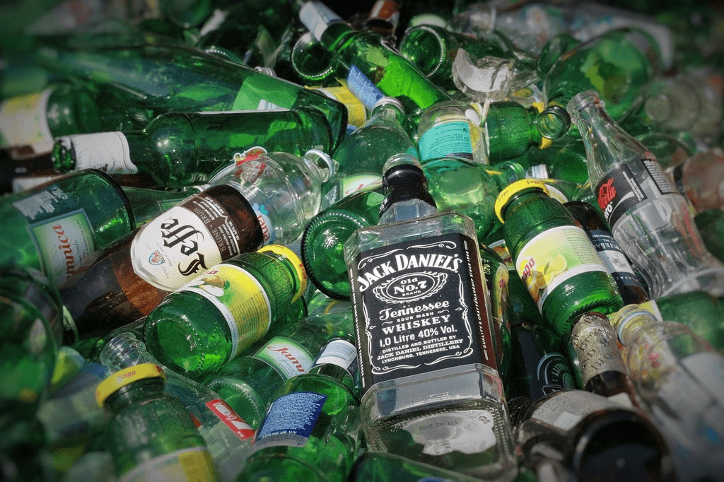 Pile of plastic and glass bottles