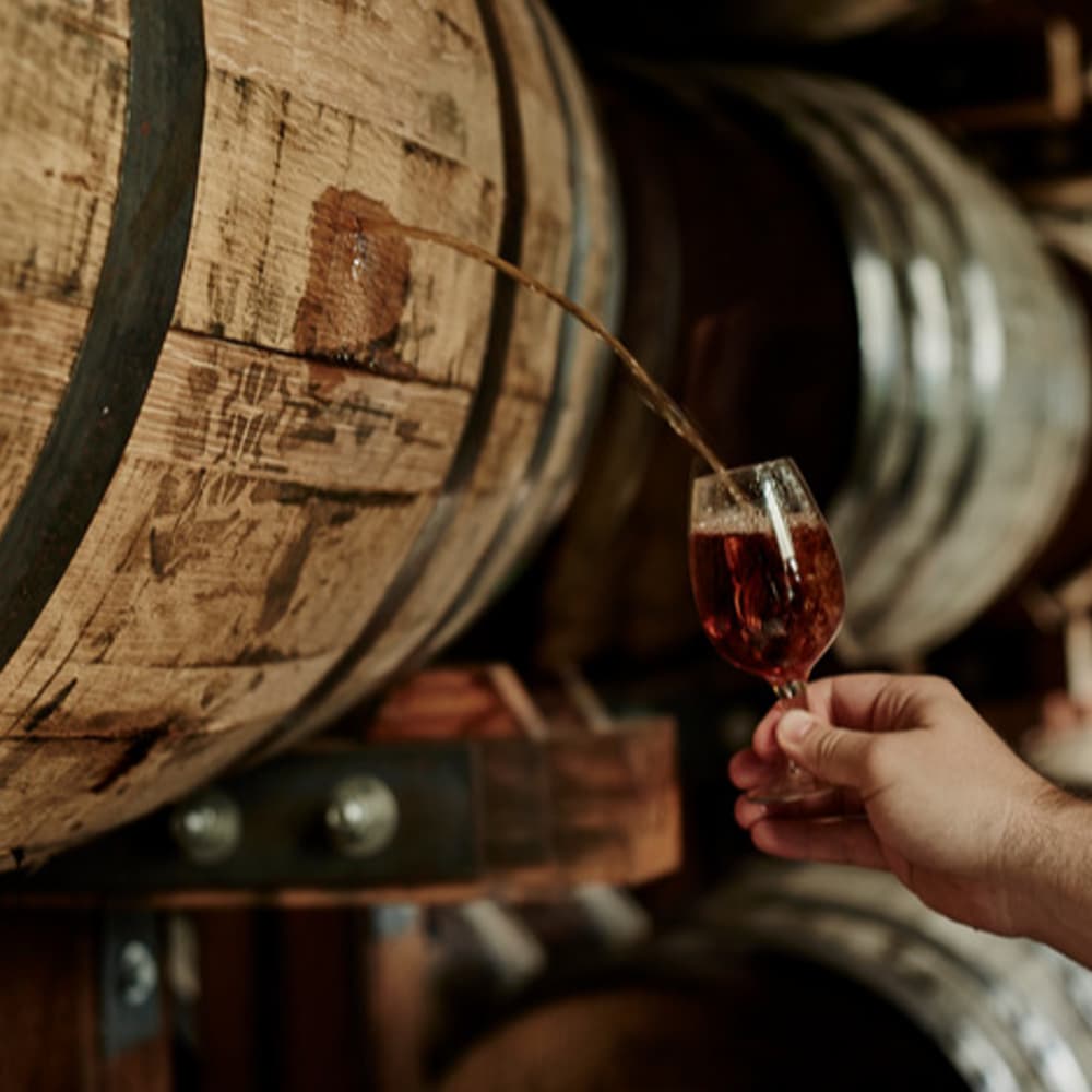 whiskey sampling from barrel