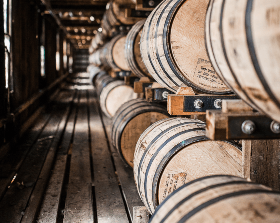 Picture of barrels stacked up inside the jack daniel distillery