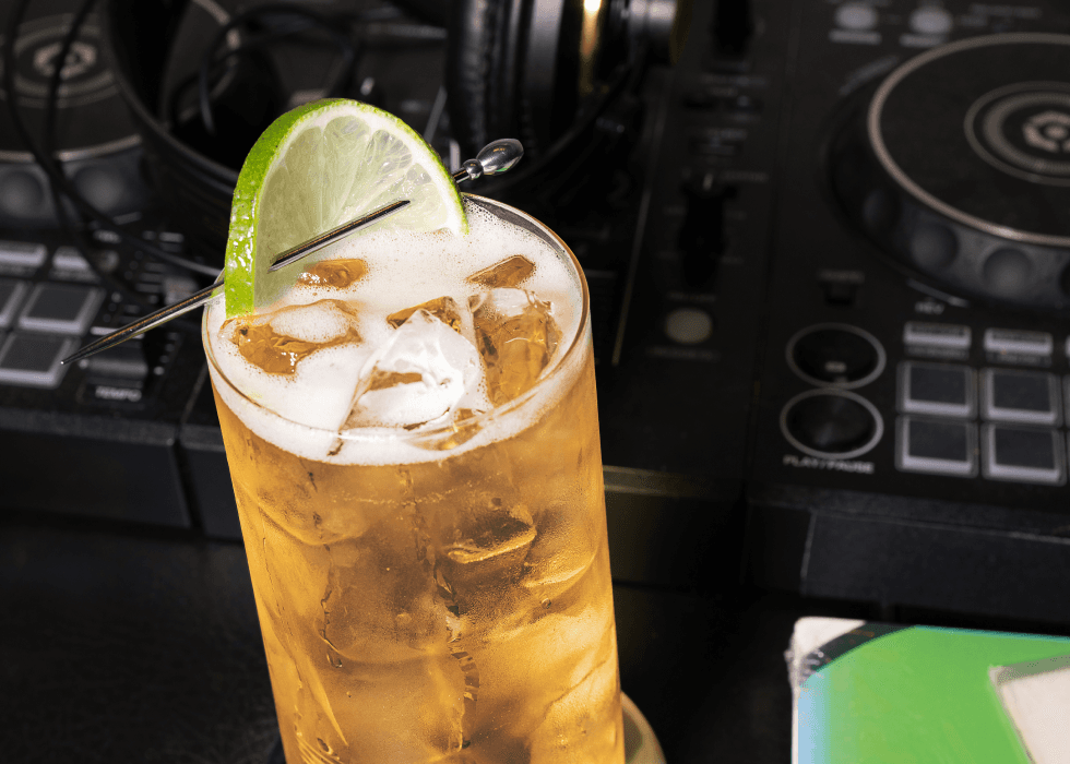 Jack and Ginger Cocktail served with lime wedge